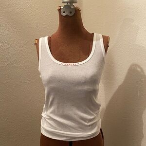 White Ribbed Tank Top. Hand embroidered in orange PEACE with french knots